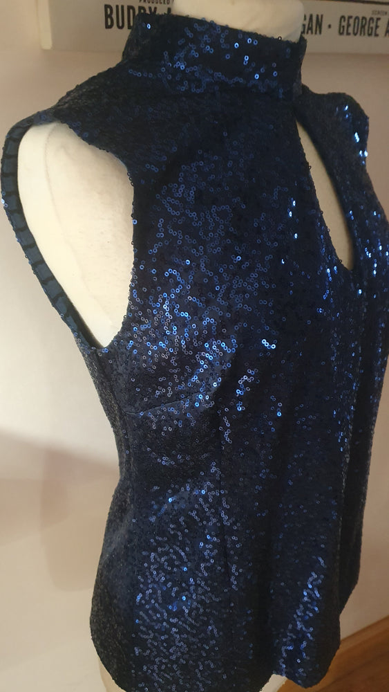 Ladies navy sequin funnel neck keyhole top