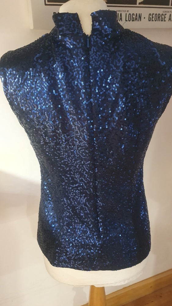 Ladies navy sequin funnel neck keyhole top