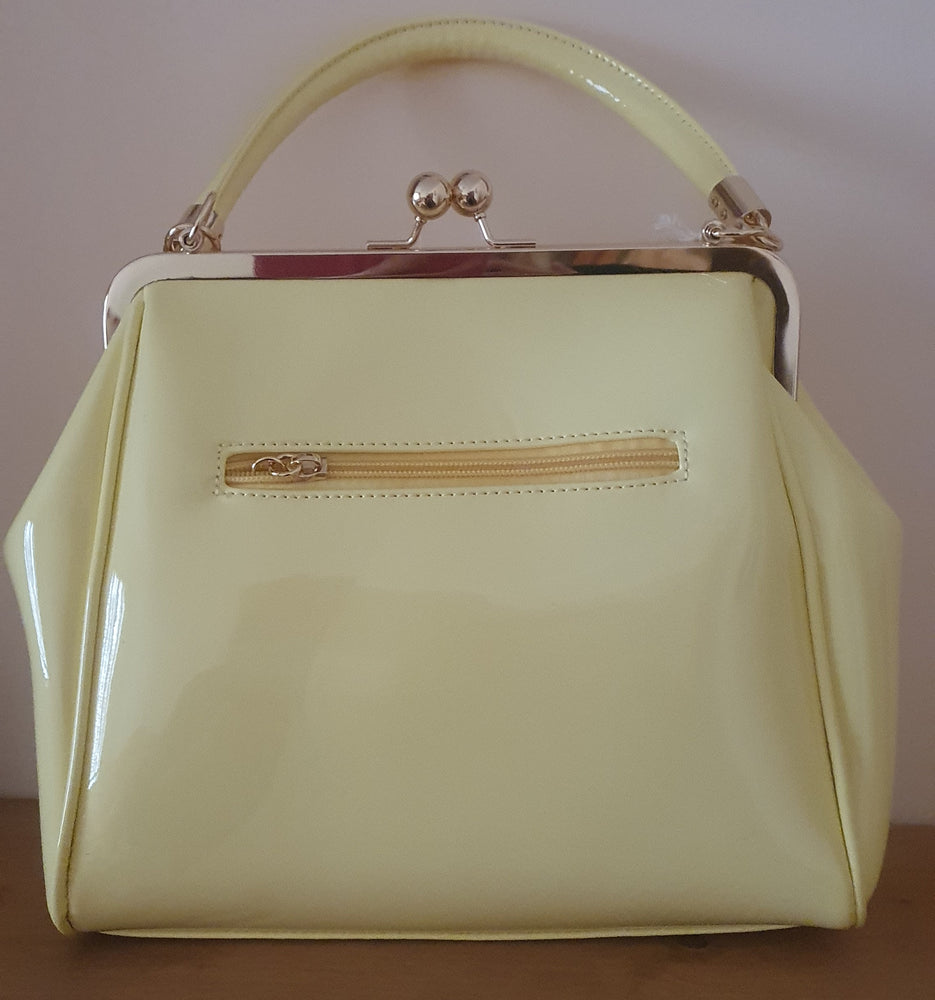 Ladies Lemon patent handbag