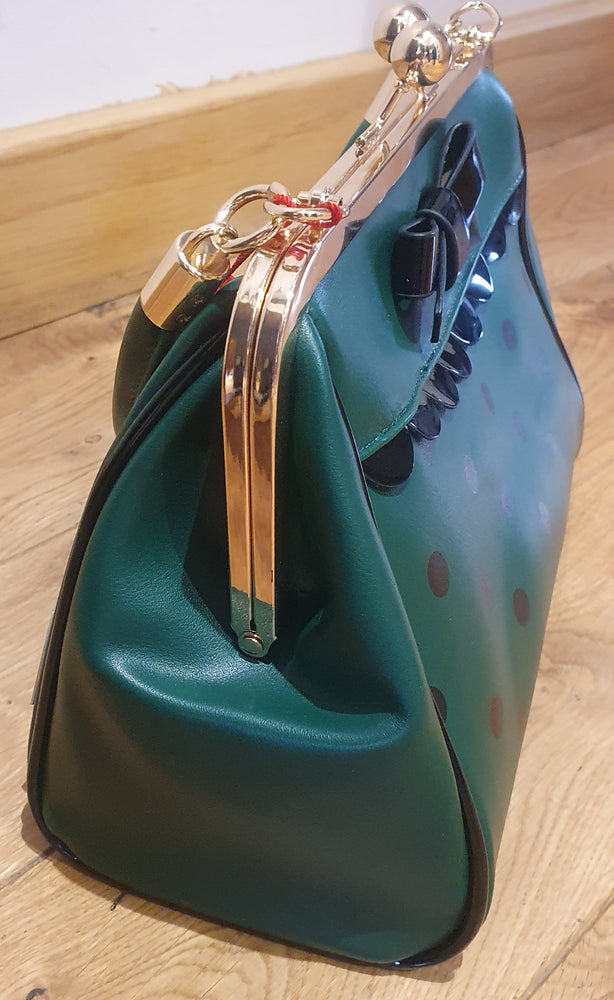 Ladies green/black spot handbag