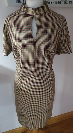 Ladies beige dogtooth keyhole funnel neck dress